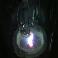 High frequency arc discharge in a metal-halide lamp